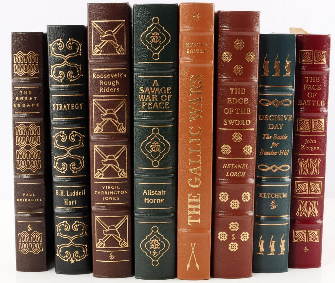 8 EASTON PRESS BOOKS ON HISTORIC BATTLES & STORIES: Lot of 8 like new Easton Press leather bound books. Title and Author: The Gallic Wars by Julius Caesar, The Face of Battle by Keegan, A Savage War of Peace by Horne, The Great Escape by Brickhill, Str