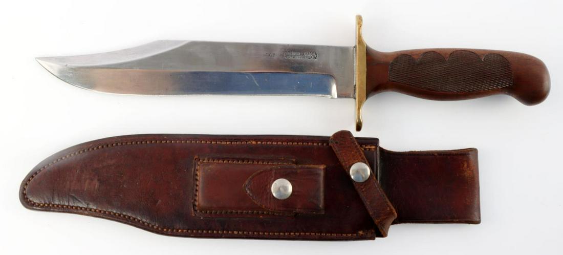 RANDALL MADE MODEL 12 VIETNAM ERA BOWIE KNIFE: American made Randall knife Model 12 with Mexican Desert ironwood handle styled with pyrography diamond pattern. Blade is 9 inches with sharp edge no chips or rolls. Accompanied by roughback sheath an