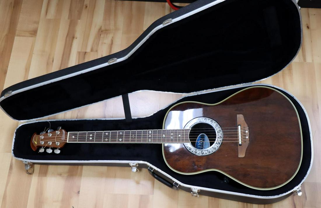 OVATION ULTRA SERIES 1517 ACOUSTIC GUITAR W CASE: Vintage Ovation acoustic guitar. 24 1/4 scale length. 1 5/8 inch 1st fret width. Abalone fret inlay. Acoustic/electric. Appears to be a walnut top. Rosewood fingerboard. Serial number: 234475. Very go