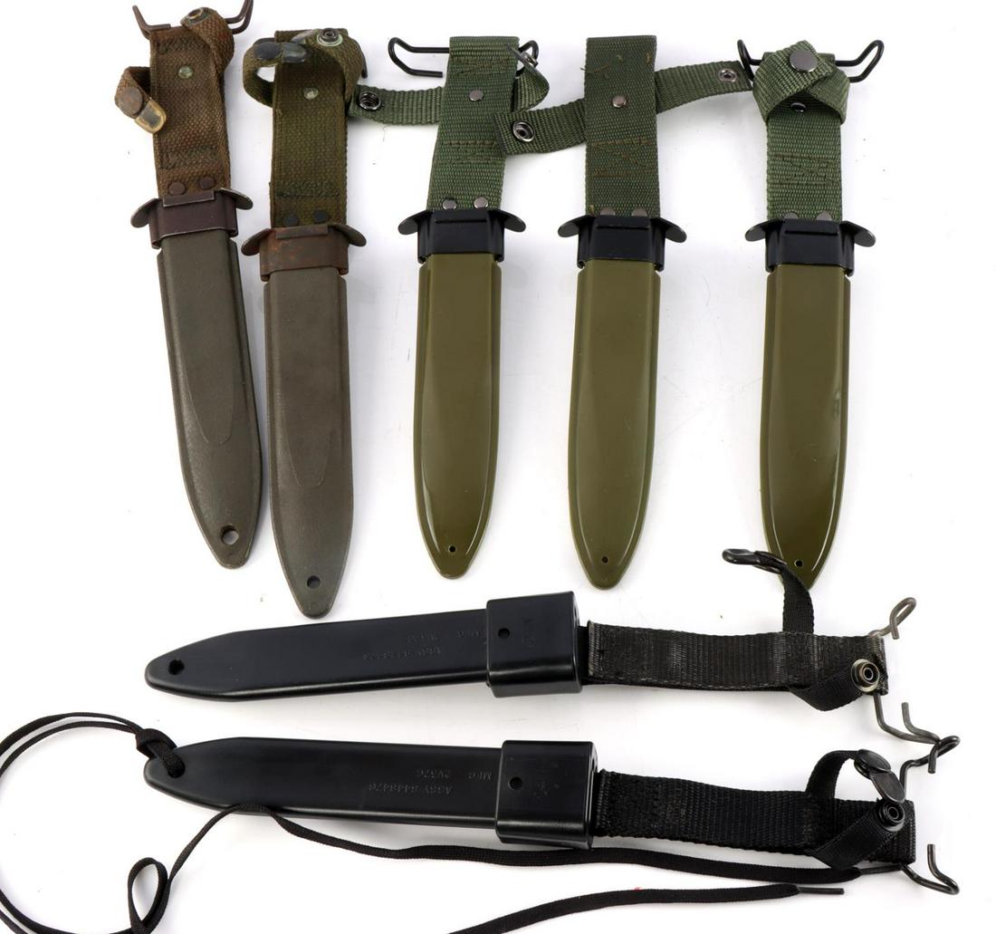2 M10 & 5 USM8A1 SCABBARD LOT 2 WWII: 2 Of the UAM8A1 scabbard are WWII or early post war, 3 appear brand new, the M10 scabbards are un issued.