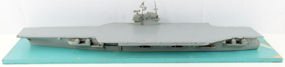 VIETNAM COMET RECOGNITION MODEL USS FORRESTAL: All metal scale 1:50. 25 inches, has wood base , approval date 1956, has some scratches port side by waist Cat, and some minor paint loss, on of the antiaircraft guns is separated but with item. Outsi