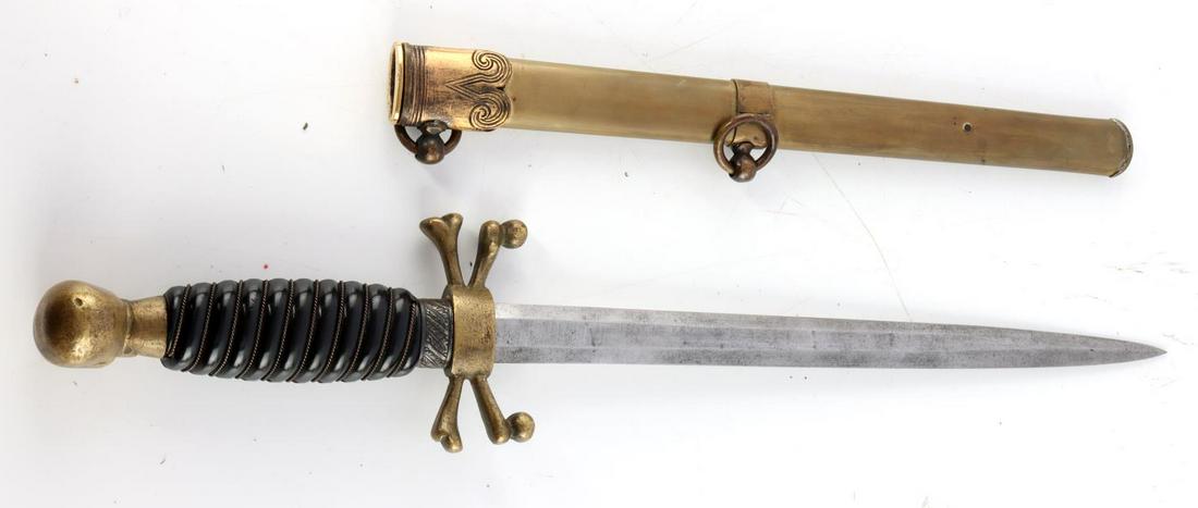 VINTAGE GERMAN MASONIC SKULL W CROSSBONES DAGGER: Vintage Masonic dagger. Steel blade with brass crossguard, pommel, and scabbard. Black celluloid grip. Measures 15 5/8 inches. No marks. Very good condition.
