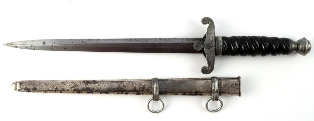 WWII GERMAN REICH FIRST MODEL RAILWAY DAGGER: Steel blade with composite grip and plated iron crossguard and pommel. Housed in a pebbled scabbard. Eickhorn marked. Blade features pitting. Measures 15 3/4 inches. Very good condition. This lot has