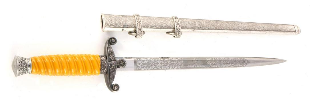 WWII GERMAN REICH HEER PRESENTATION HOMAGE DAGGER: WWII German Reich Heer presentation homage dagger in very good condition. Etched blade marked on ricasso "Clemen & Jung Solingen". Crossguard, Grip, and pommel all in good condition. No marks on tang.