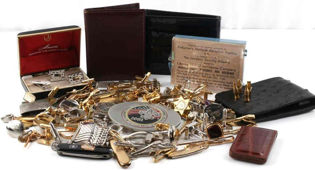 UNSEARCHED MENS CUFFLINKS TIE CLIPS & WALLETS: 2 pounds of assorted vintage to modern tie clips, money clips, pins, cuff links (including coca-cola bottle cuff links) and a Boy Scout belt buckle. Lot also includes 3 Wallets, a Ostrich Leather Back