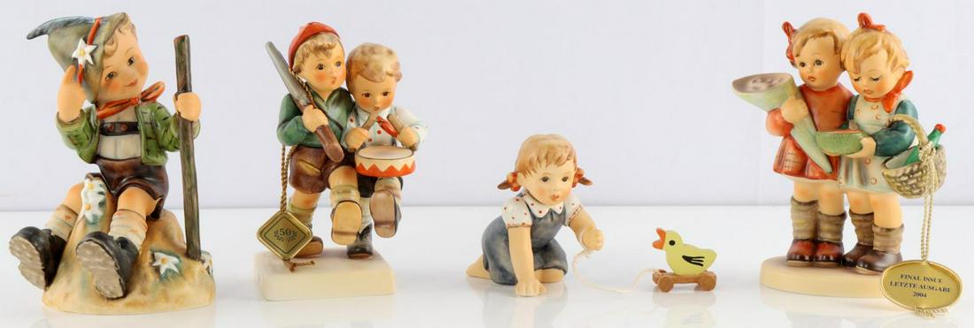 LOT OF FOUR GOEBEL M J HUMMEL FIGURINES IN BOXES: Lot of four Gorbel M. J. Hummel figurines in original boxes with C.O.A.s and papers. All German made. #1812 Volunteers 1952-2002 50 year anniversary edition, 5 inches tall. #2199 Mountaineer 2001, 5.1