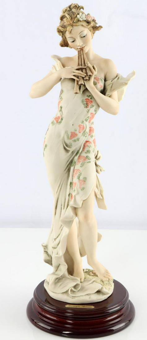 GIUSEPPE ARMANI MELODY 1995 MEMBERSHIP SIGNED: Melody-656c is a society members only figurine. This Armani piece was issued in 1995 and closed in 1996. Melody stands 14 1/2 " tall, bare footed playing her Pan pipe. - 656C. Giuseppe Armani (1935-20
