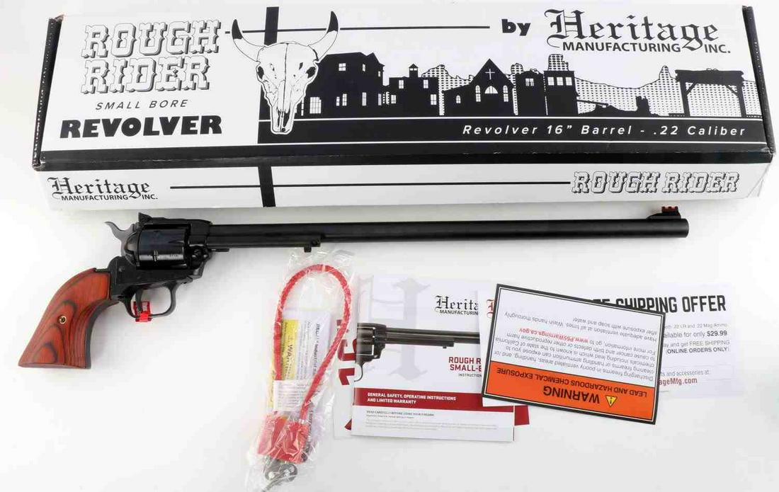 NEW IN BOX HERITAGE 16 INCH BARREL 22LR REVOLVER: New in box Heritage Rough Rider Small Bore Revolver, measures approx. 22 X 1.5 X 5 inches. Has a 16 inch barrel, 22LR caliber, 6 round capacity, front and rear sights, dark wood styled Zamak 5 grip. C