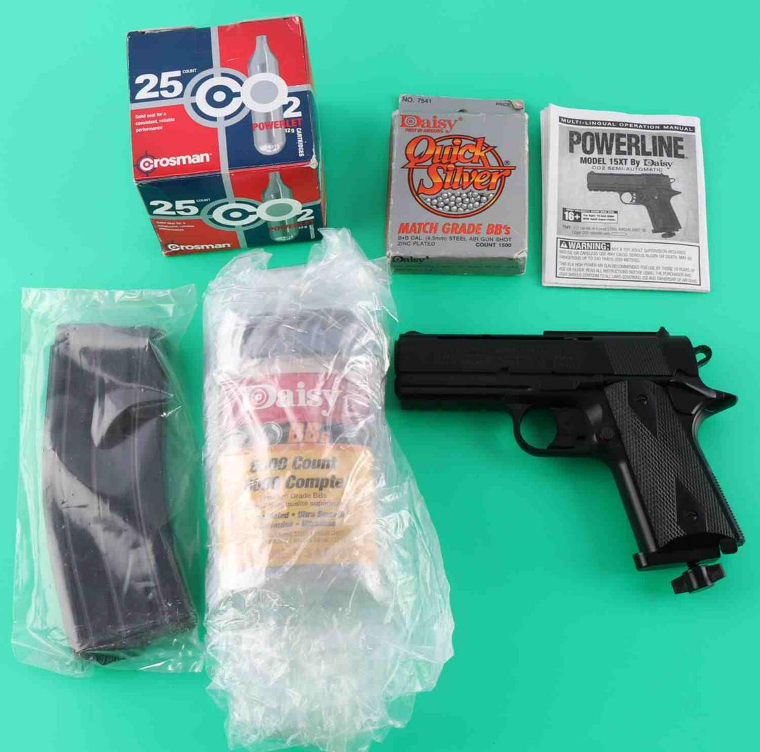 COLT POWERLINE MODEL 15XT BB GUN WITH 6000 BBS: Lot features a Colt model BB gun pistol with 6000 BBs and a 5.56 magazine. Very good condition. 7 1/4 inch gun. 6 3/4 inch magazine. This lot has a reserve.