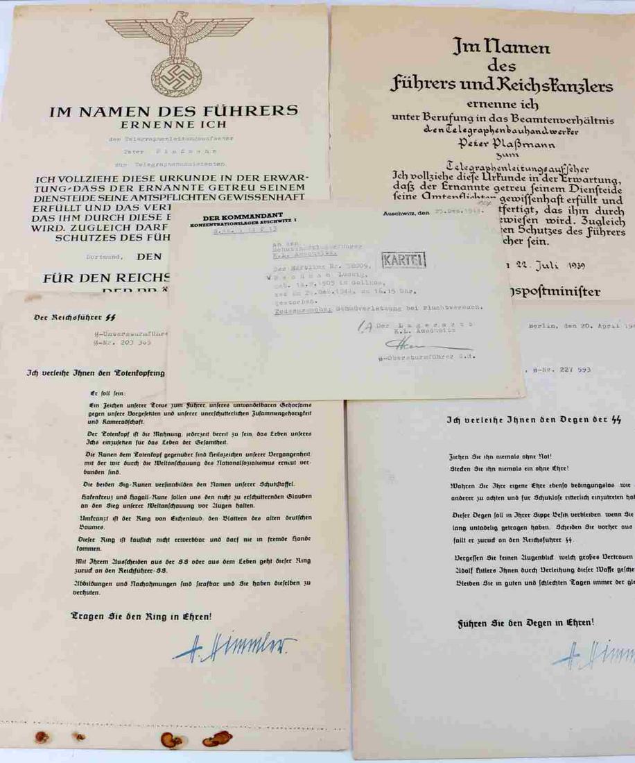WWII GERMAN THIRD REICH EPHEMERA LOT AUSCHWITZ: Lot features an Auschwitz death certificate from the concentration camp, 2 original award citations with original signatures, and Himmler honor ring and SS dagger citations signed. Very good condition