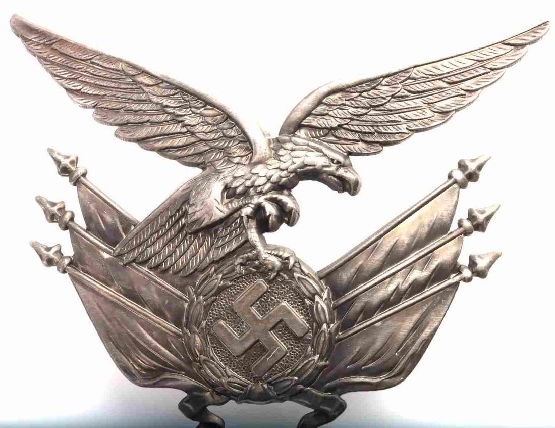 WWII GERMAN THIRD REICH LUFTWAFFE GORGET PLATE: Third Reich Luftwaffe gorget plate. Nice toning. Measures 3 1/2 inches. Very good condition. 4 pronged back. This lot has a reserve.