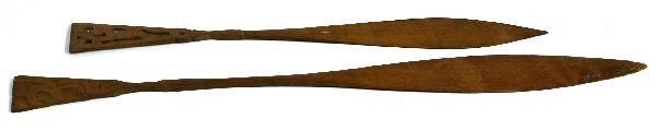2 WWII ERA CARVED MAORI CEREMONIAL PADDLES: 2 carved wooden Maori paddles both dates 1945 in pencil. 48 and 38 inches in length. Very good condition with wear to tips.