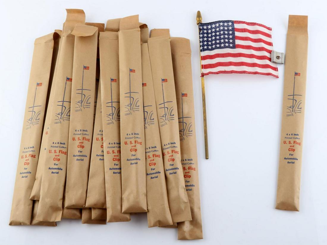20 48 STAR U.S. HAND HELD FLAG LOT NEW OLD STOCK: In its original package, with automobile aerial clip, flags measure 4 by 7 inches.