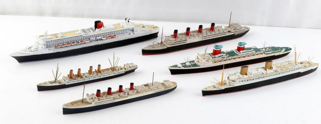 6 SHIP MODELS AQUITANIA QUEEN MARY BREMEN & MORE: Lot of 6 ship models. All seem to be in the 1/1200 to 1/1250 scale. Lot includes M426 metal Kron Prinz Wilhelm, Waterline Ship Models Aquatania, wood SS France no maker, CM Metal Models 323 Queen Mary