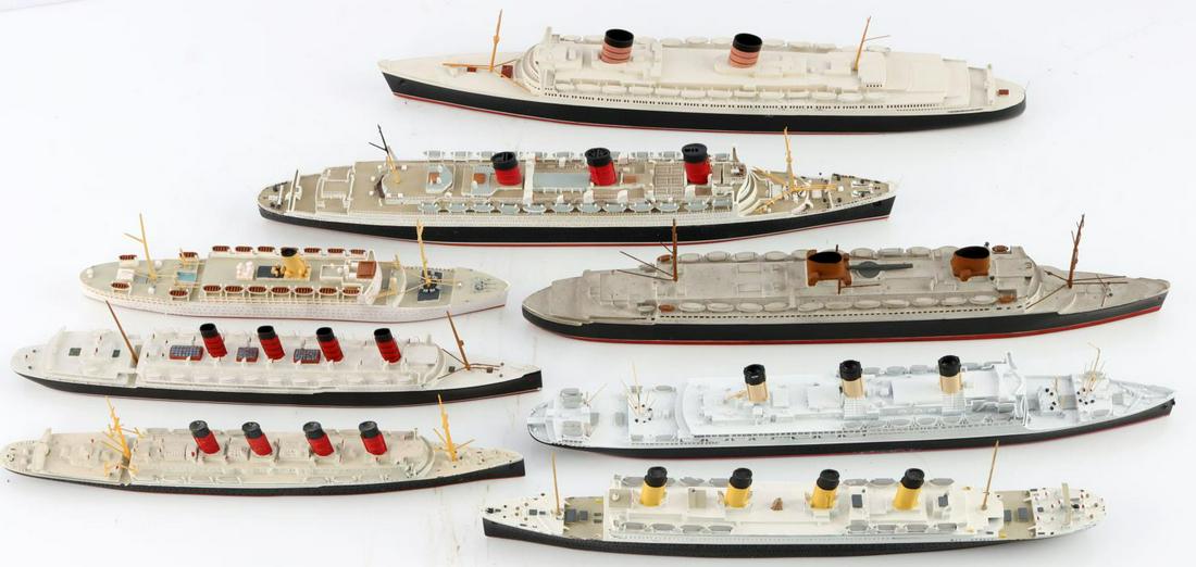 LOT OF 8 SHIP MODELS MERCATOR TITANIC MAURITANIA: Lot of 8 ship models. All 1:1250 scale. Lot includes Mercator metal M404 Titanic, M405 Mauritania, metal CM 103 Bismarck, Waterline Model ship Bremen in wood, L35 Strathmore in wood, Metal CSC 002, 2 