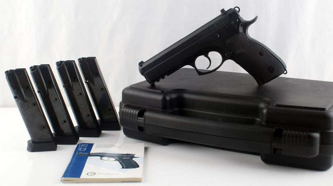 CZECH CZ 75 SP-01 TACTICAL SEMI AUTO 9MM PISTOL: Czech CZ 75 SP-01 Tactical semi automatic 9mm pistol with four magazines in box with owner's manual. Barrel features a bright and clear bore. Action is smooth, as is safety and magazine release. FFL r
