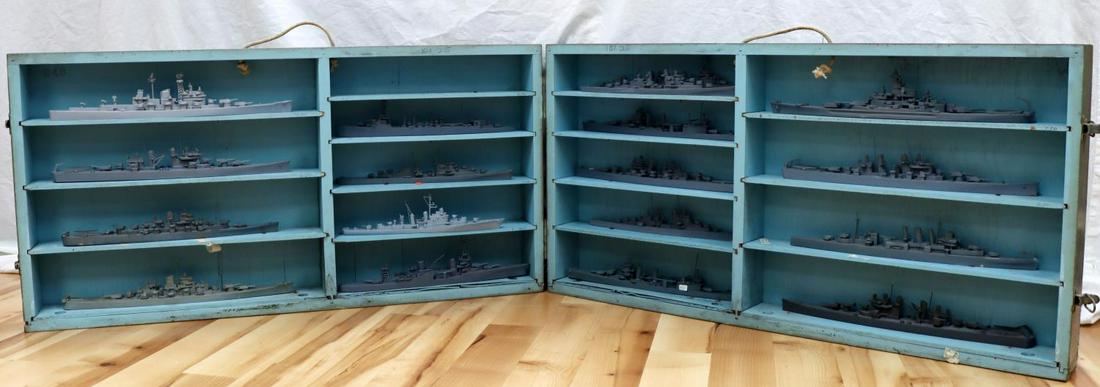 18 WWII U.S. NAVY TEACHER RECOGNITION SHIP MODELS: In an original carrying box, unmarked containing 18 1:1200 scale, 11 to 16 inch models, mixed Comet, Framburg, most are not attached to the boards and may be mis identified, cruiser and BB class mostl