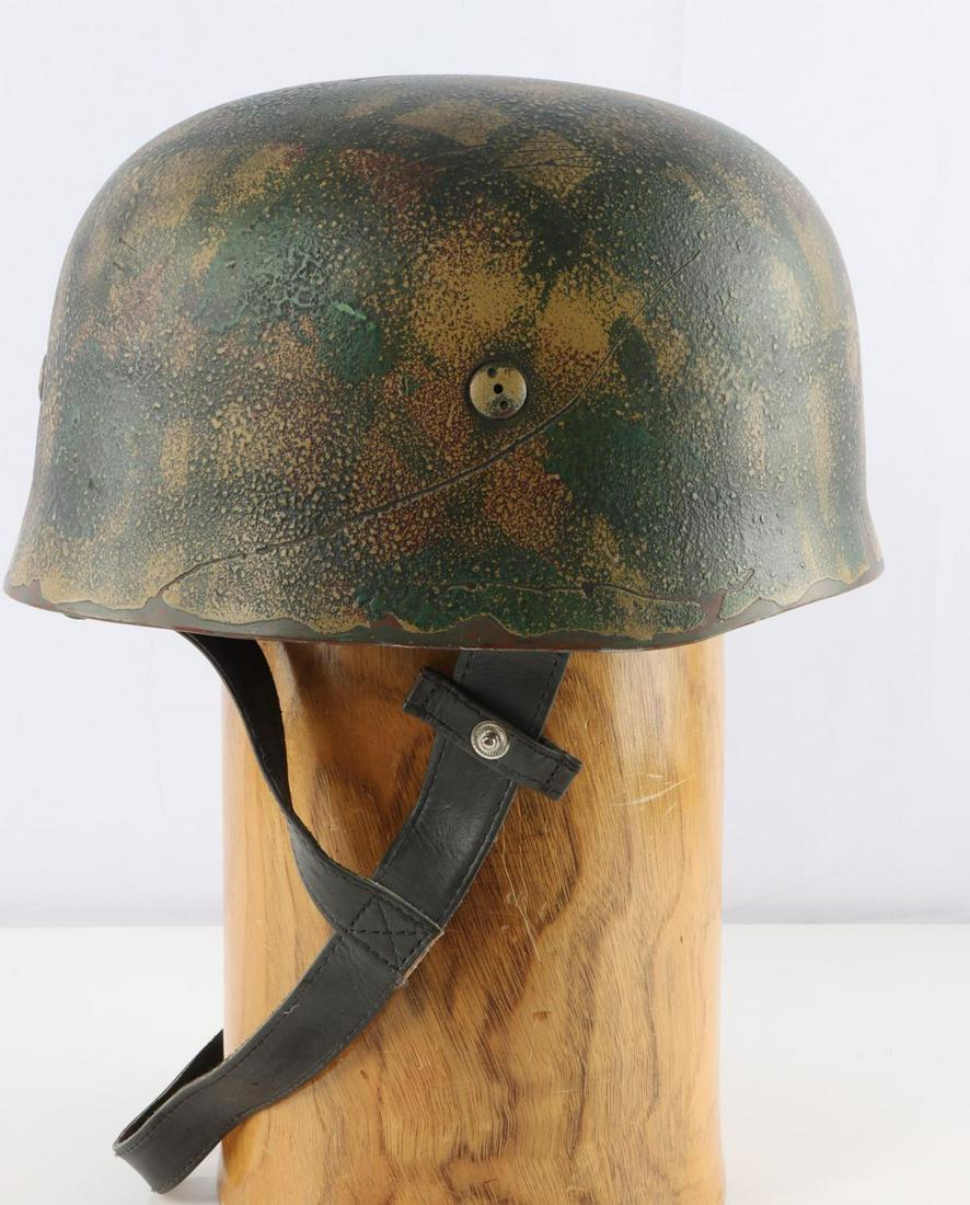 WWII GERMAN LUFTWAFFE PARATROOPER CAMO HELMET: German WWII Luftwaffe Paratrooper Fallschirmjager Camo Jump Helmet. This has the Normandy camouflage colors of reds, greens and tans. Has the four early three holed spanner type bolts. Includes the le