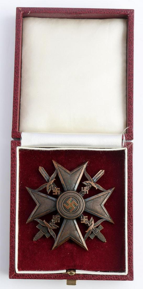 WWII GERMAN CASED SPANISH CROSS WITH SWORDS: Cased German WWII Condor Legion Bronze Spanish Cross With Swords. The Spanish Cross measures 2 5/16” wide by 2 5/16” tall. The front shows a swastika in the center of a four armed Maltese cross. T