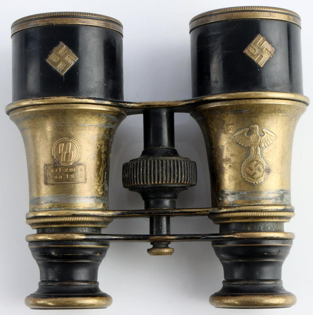 WWII GERMAN WAFFEN SS OFFICERS FIELD BINOCULARS: German WWII Waffen SS Officers Field Binoculars. They measure 3 7/8 X 3 11/16 inches. The left eye piece is marked with a pair of Waffen SS runes. Below they are maker marked and dated Carl Zeiss Jena