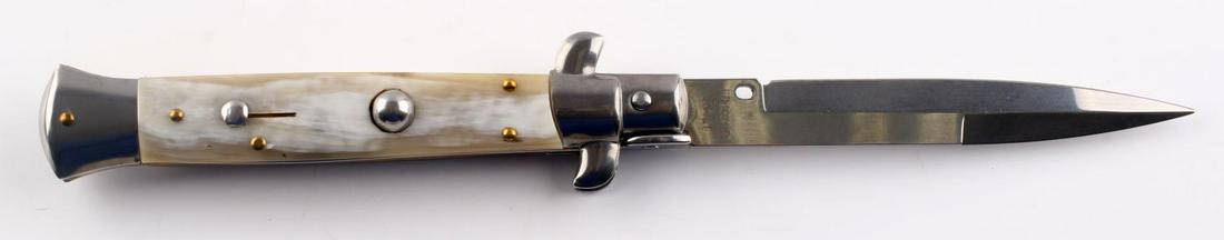 ITALY MADE FRANK B SWITCHBLADE AUTOMATIC KNIFE NIB: New in box. Measures 9 inches opened and 5 inches closed. Blade stamped Frank B Italy.