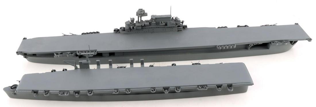 2 WWII COMET RECOGNITION MODEL AIRCRAFT CARRIER: Essex class and USS Independence class measure , 20 and 14 1/2 inches, the Essex is unmarked base metal and wood probably Framburg, the Independence is stamped Comet and named, both appear complete. T