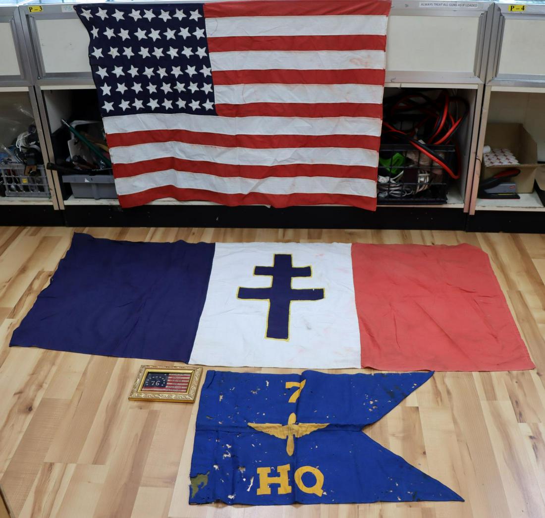 MIXED FLAG LOT OF FRENCH FORCES CARTER AIR SERVICE: Lot of 4 features a small Jimmy Carter campaign flag, a wool 7 HQ US Air Service guidon with some holes and staining, a Free French Forces flag made of linen, and a 48 star US flag made of cotton. Mea