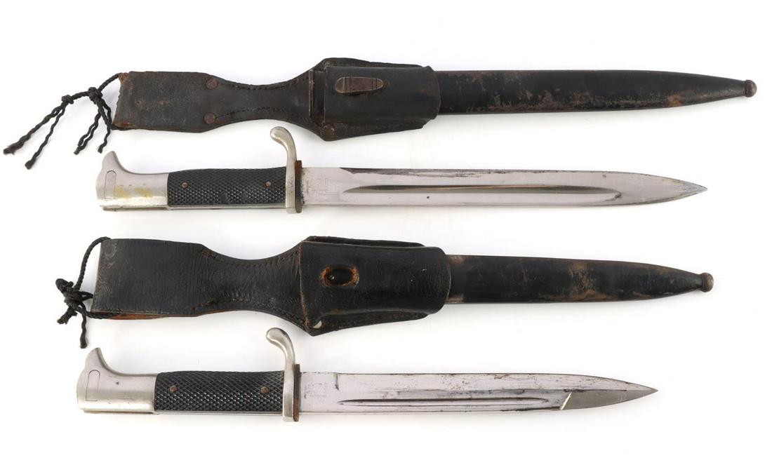 2 WWII GERMAN K-98 DRESS BAYONET LOT 12 & 14 INCH: One is 14 1/4 overall the other 12 1/2, each with scabbard and frog, the lesser blade scabbard frog nipple is missing, and frogs have wear. Blades are as photographed, both are Eickhorn.