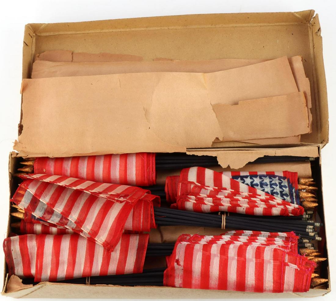 NEW OLD STOCK VINTAGE UNITED STATES 48 STAR FLAGS: 12 Dozen flags. Measure 4 X 6 X 10 1/2 inches. Very good condition. Silk construction. Comes with factory wrapping.
