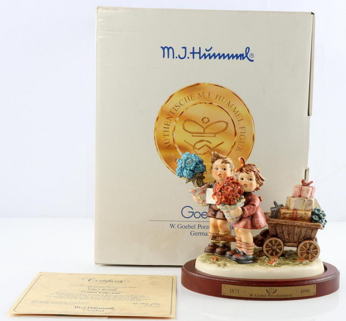 HUMMEL LOVES BOUNTY 751 PORCELAIN FIGURINE W BOX: Measures 5 inches approximately. Very good condition with no crazing or chipping.