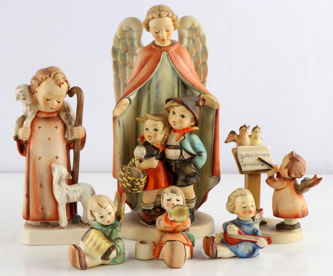 6 1950S & 1960S HUMMEL GERMAN & WEST GERMAN ANGELS: Lot of 6 Vintage German and West German Hummel porcelain figurines includes Good Shepard 42/0 (TKM3), 9 inch Heavenly Protection Angel (TMK4) and four 3 to 4 1/2 inch angel candle holders and conducto