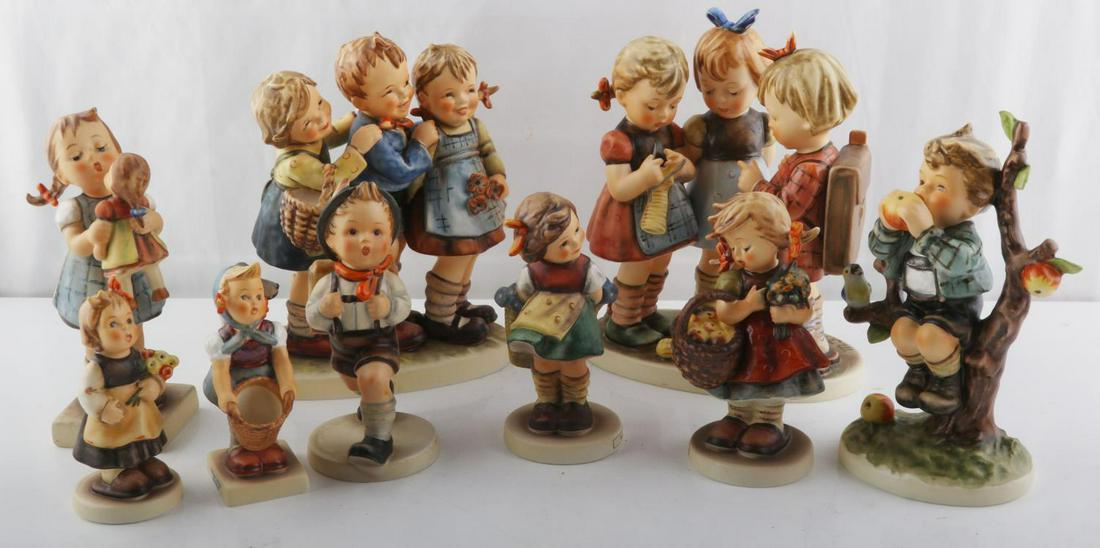 COLLECTORS HUMMEL LOT OF NINE PAINTER SCHOOL BOY: Lot of 9 Hummels includes: "School Girls" (#177/I), TMK 7"Follow The Leader" (#369) signed my Master Painter, TMK 7"An Apple A Day" (#403), TMK 7"Kiss Me" (#311), TMK 5"School Boy" (#82/0), TMK 3"Autu