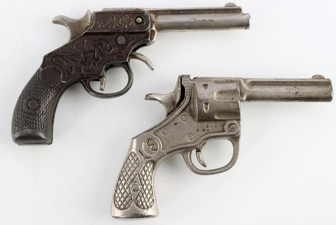 KENTON 1899 AND 1915 CAST IRON TOY CAP GUN: Kenton make. Measure 5 1/2 inches. Very good condition.