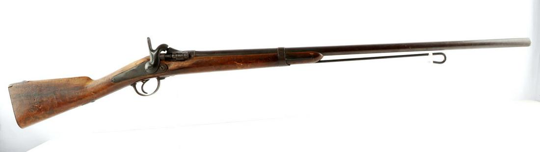 US MODEL 1881 TRAPDOOR SPRINGFIELD FORAGER SHOTGUN: US Model 1881 Trapdoor Springfield Forager 20 gauge shotgun. Barrel measures 33 inches long and features a clear and mostly bright bore with some finish loss. "Trapdoor" action is smooth and functions