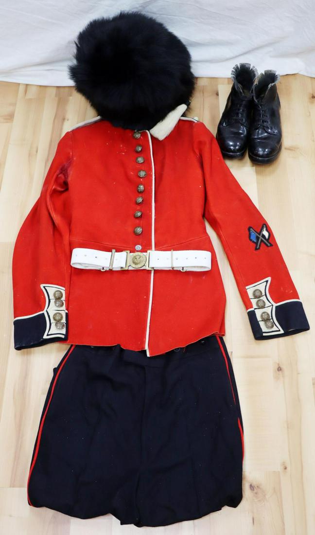 WWII GRENADIER GUARDS UNIFORM BEARSKIN BUSBY: EM Tunic small size pretty heavy mothing with Kings Crow buttons and sleeve insignia, trousers small size but good, medium ankle boots, and period Busby with chinstrap and pom, waist belt included.