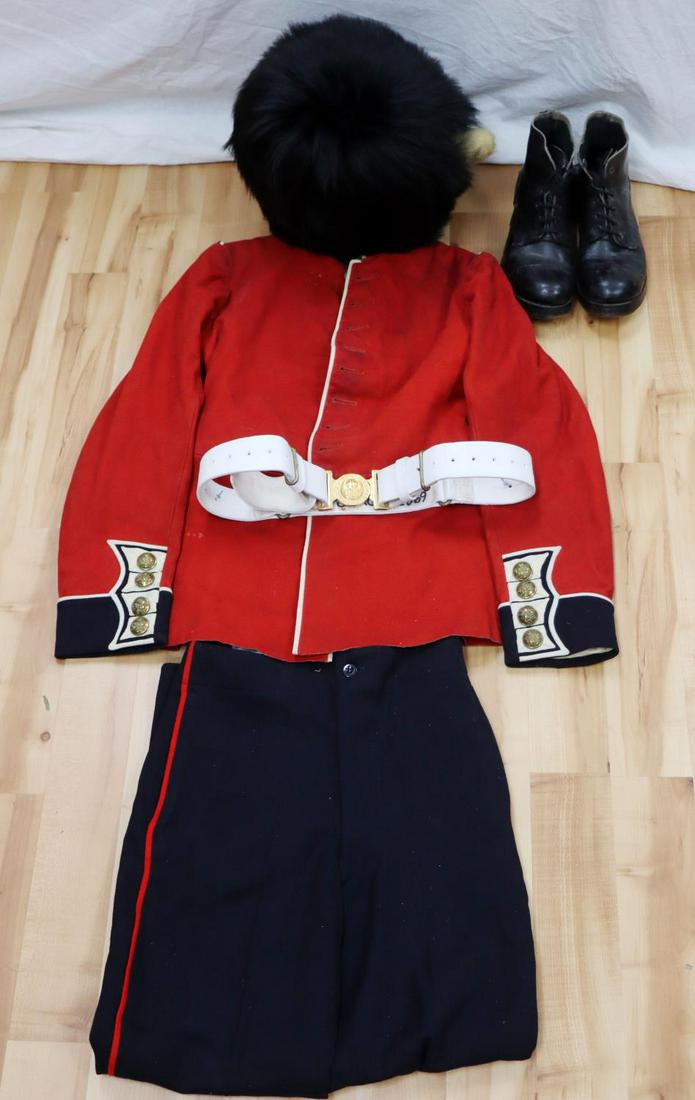 GRENADIER GUARDS EM UNIFORM & BEARSKIN BUSBY: The tunic has some mothing and stains, small size with 1951 date tag inside, Kings Crown buttons, would have transition to QEII shortly thereafter, medium ankle boots, belt small size good trousers, B