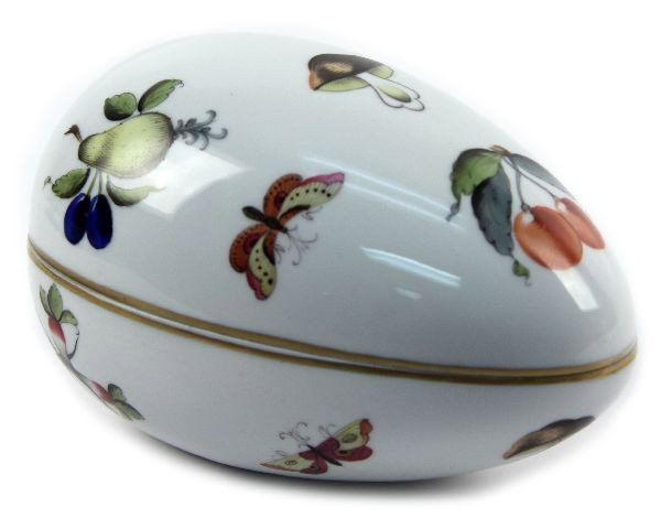 HEREND PORCELAIN EGG DRESSER BOX WITH LID: Porcelain egg shaped dresser box with removable lid. 6.5 by 4.5 inches. Carries incised Herend mark plus blue Hungry mark. Very good condition.