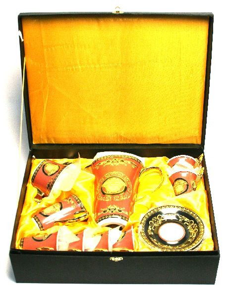 VERSACE ROSENTHAL MEDUSA COFFEE SET: Versace Rosenthal Medusa coffee set including six winged coffee cups, creamer cup, sugar bowel with lid, pitcher with lid, and six saucers. Comes with case. Overall in excellent condition.