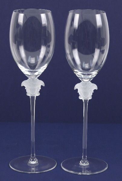 ROSENTHAL VERSACE LUMIERE CRYSTAL WATER GOBLETS: Two Rosenthal Lumiere Water goblets. Designed by Versace. Medusa pattern. Pristine crystal with frosted stems. 11.5 inches tall and a full 3 inch diameter. Medusa the goddess of sovereign female wisdo