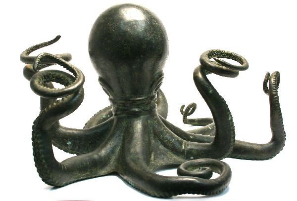 ANTIQUE BRONZE OCTOPUS: Antique 1930s-1940s bronze octopus statue featuring stylized eyes. Octopus is roughly 15 inches tall and 26 inches wide. The statue's eight arms reach into all directions. Overall in excellent conditi