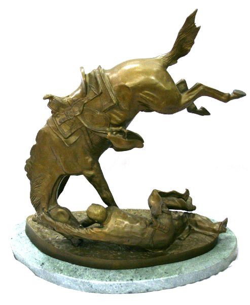 F. REMINGTON BRONZE SCULPTURE WICKED PONY: Frederic Remington (American, 1861-1909) bronze "Wicked Pony" mounted on marble base. 24 inches tall, 21 by 12 inch base. Very good condition.