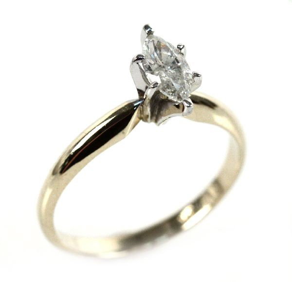LADIES 14K YELLOW GOLD DIAMOND MARQUISE: Ladies 14K yellow gold, size 7, diamond ring with marquise solitaire, approx 0.5 ct. Size: 7 Weight: 2.8 Condition: Very good