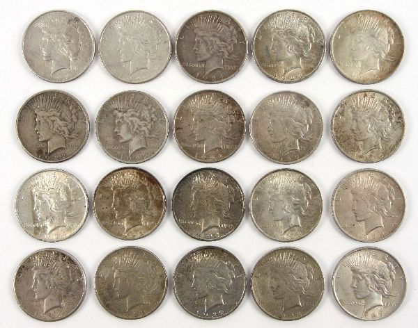 PEACE SILVER DOLLAR CIRCULATED LOT OF 20 F - VF: Peace silver dollar circulated lot of 20, all 90% silver, with grades from F - XF, mostly problem free and with some mint marks noted as follows: 1922 (9), 1923 (6), 1924 (3), 1925 (1), and 1927.