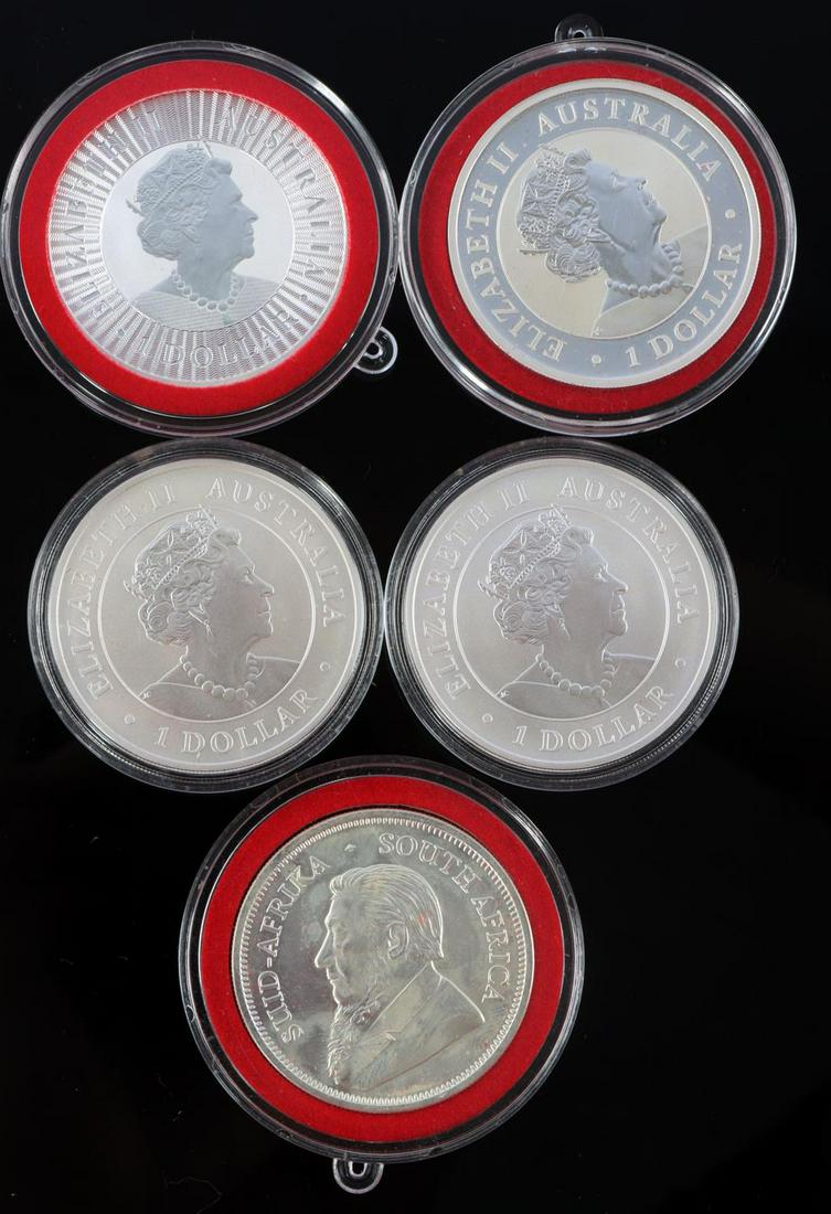 5 AUSTRALIA & KRUGERRAND 1 OZ SILVER DOLLAR COIN: 5 $1 1 Troy ounce .999 fine silver coins; 4 from Australia and 1 South African Krugerrand. The Australian bullion coins bears the image of either a Kangaroo, Kookaburra or Koala on the reverse