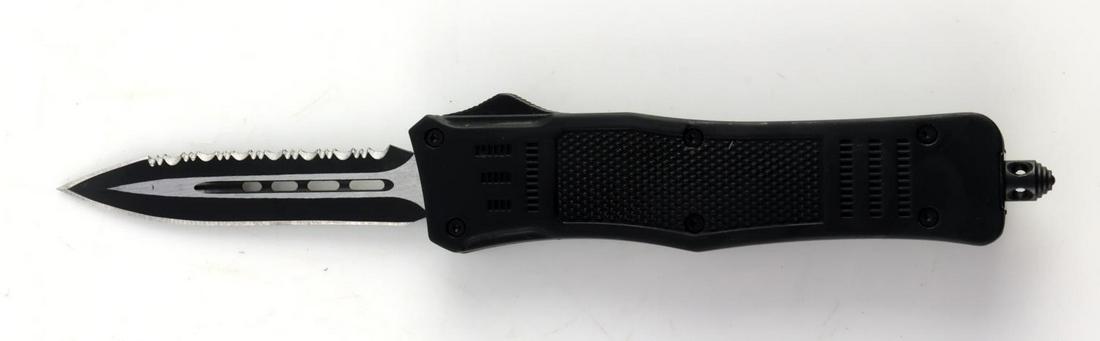 BLACK OPS TACTICAL OTF SPRING LOADED KNIFE NIB: New in box with sheath, measures 8 inches opened.