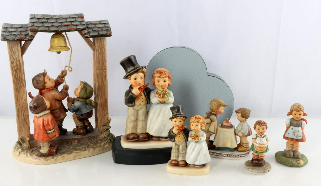 GOEBEL HUMMEL LOT OF SIX PORCELAIN FIGURINES: Goebel M.J. Hummel "Dearly Beloved, #1947." 4.25 inches tall, circa 2002, made in Germany, piece features bee logo and signature, comes in original heart-shaped gift box and original packaging box, in