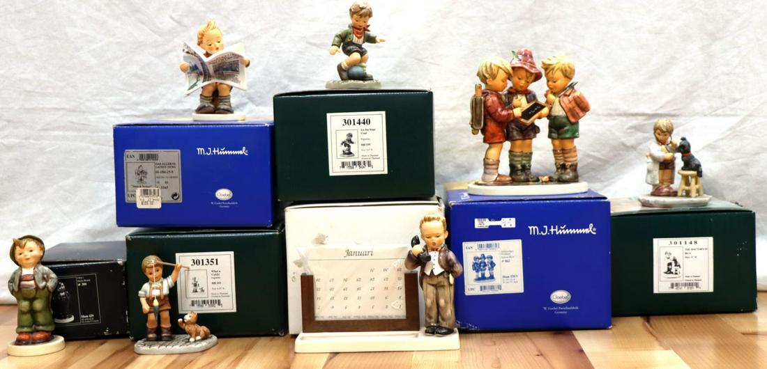 SEVEN GOEBEL GERMANY HUMMEL PORCELAIN FIGURINES: Goebel M.J. Hummel "School Boys, #862." 7.5 inches tall, circa 1999-2008, signed, original box included, original condition. Goebel M.J. Hummel Club "Hello World, #399, Exclusive Edition." 5.15 inches