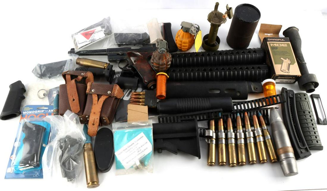 LARGE LOT OF GUN PARTS FOREGRIPS & INERT GRENADE: Lot includes inert grenades and shells, foregrip, hand guards, springs, and a pellet gun. Very good condition.