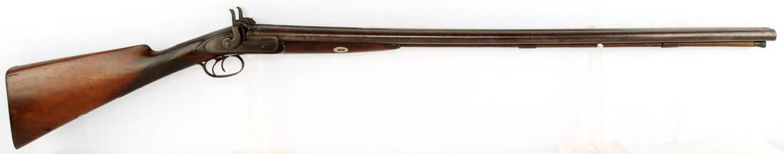 ISAAC HOLLIS & SONS 12 GAUGE MUZZLE LOADER SHOTGUN: I. Hollis & sons muzzle loader shotgun in good overall condition. Barrel measures 33 3/8 inches long Bore is bright. Marked "London Stub Twist" on top of barrel. Trigger and hammers function without i