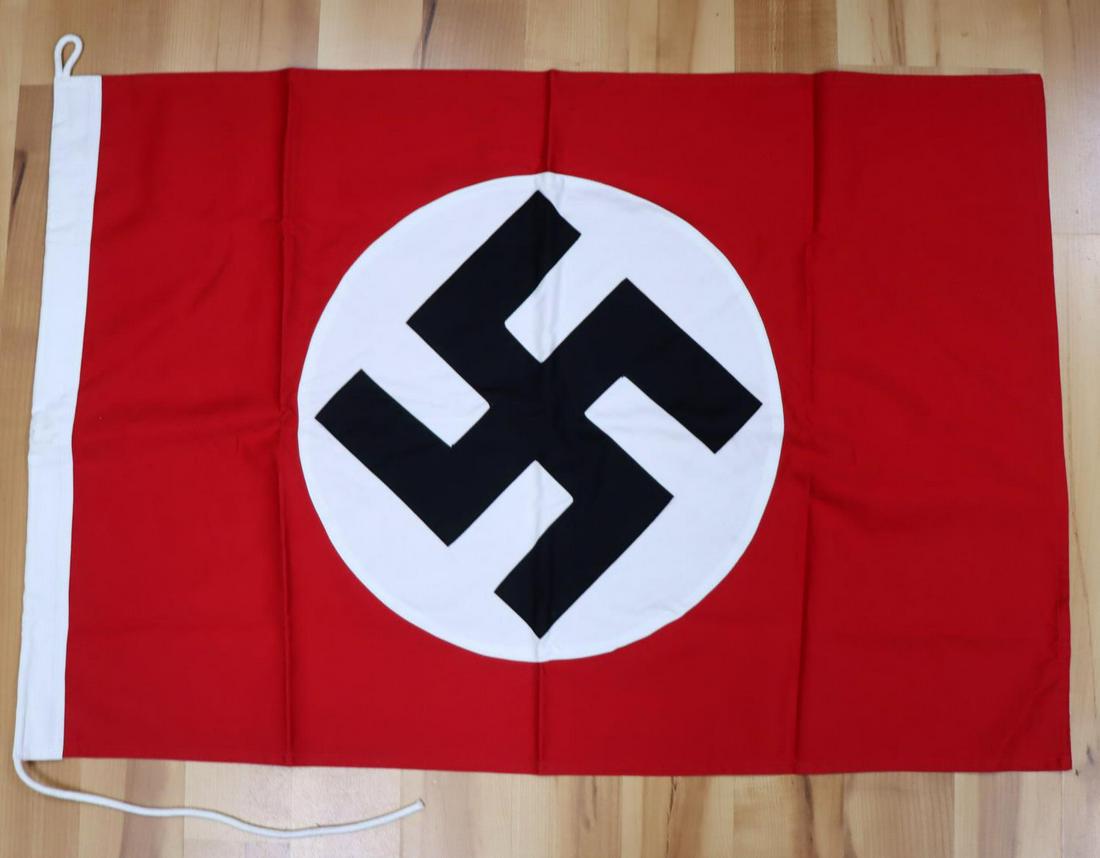 WWII GERMAN THIRD REICH NSDAP FLAG 36X25 INCHES: WWII German Third Reich homage NSDAP flag. Measures 36X25 inches. Very good brand new condition. Unauthenticated, sold as is. This lot has a reserve.